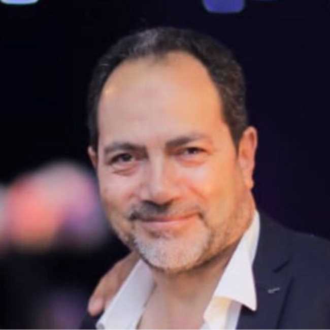 <span class="dr-prefix">دكتور</span> أمين عبد الحميد